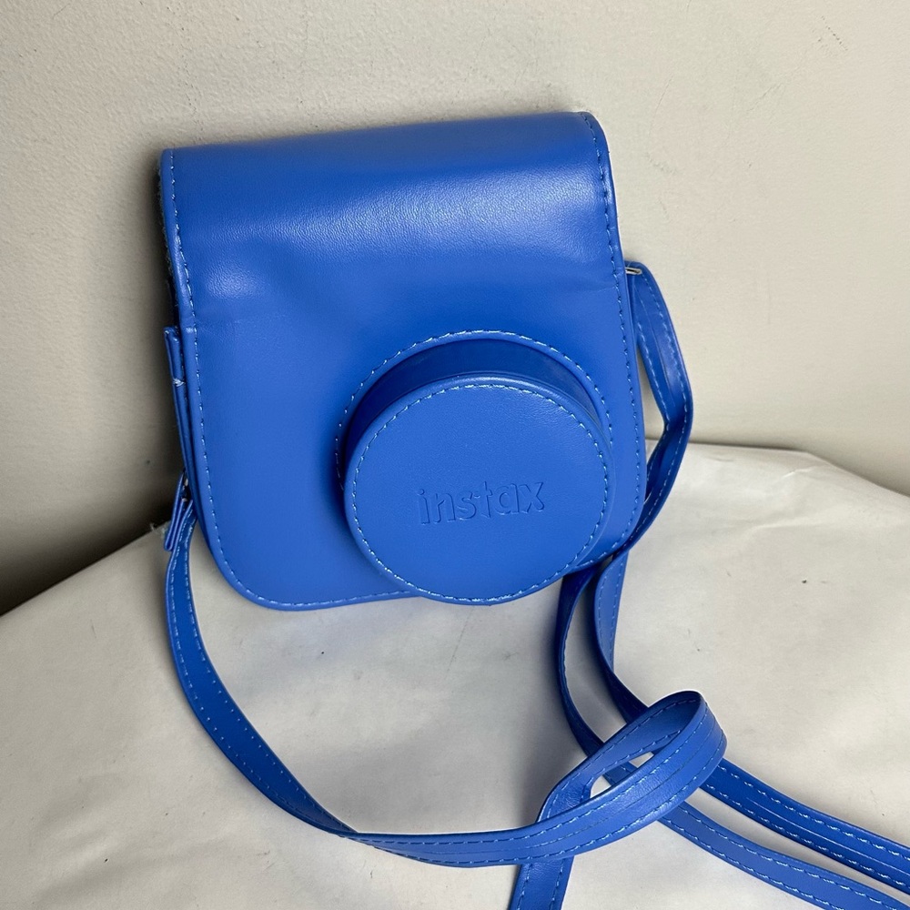 Instax Blue Crossbody Bag with Adjustable Strap and Structured Design
